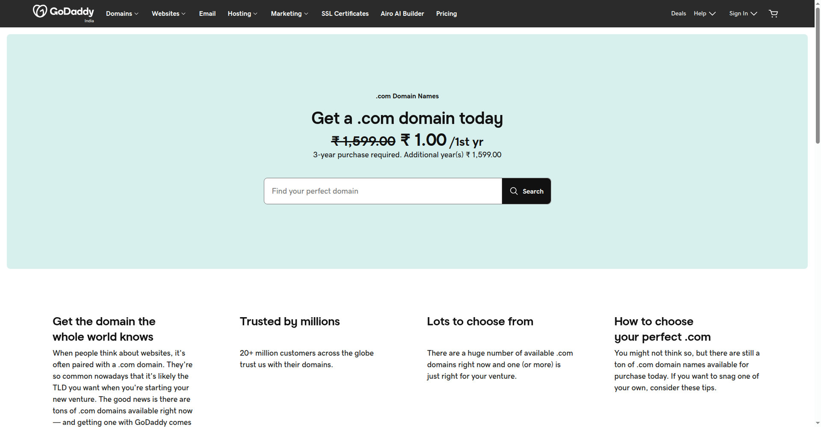 GoDaddy India ka .com domain page — strike-through ₹1,599.00 ke saath ₹1.00/1st yr offer